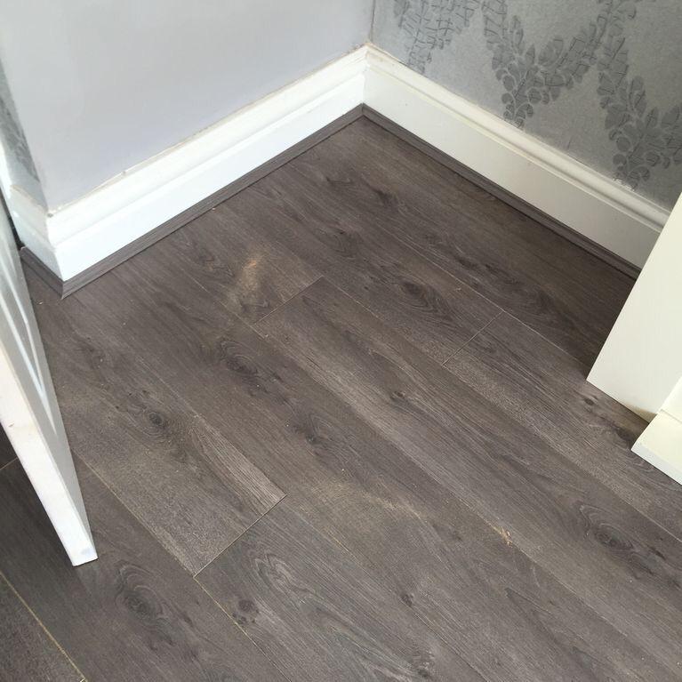 Textured wood laminate flooring